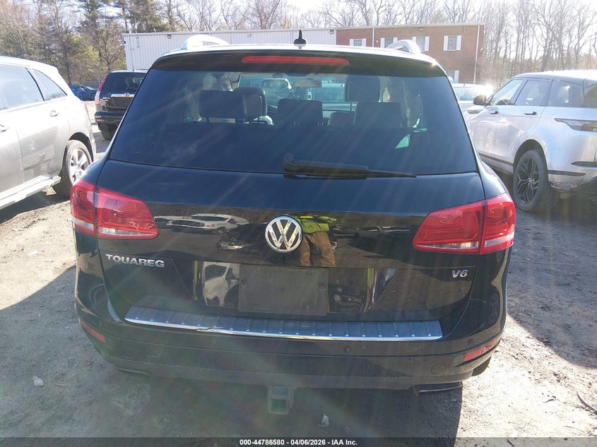 2014 Volkswagen Touareg 3.6L Lux VIN: WVGEF9BP1ED001446 Lot: 44786580