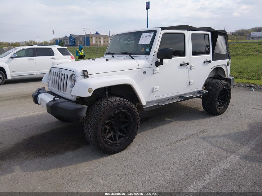 2016 Jeep Wrangler Unlimited Sahara 1C4BJWEG6GL124491 photo 1