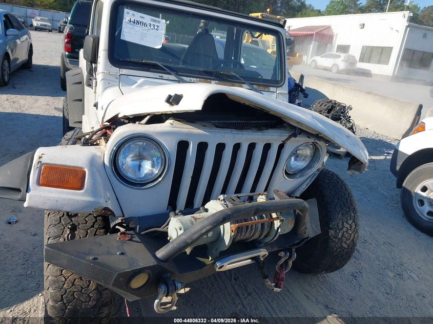 1999 Jeep Wrangler Sahara VIN: 1J4FY49SXXP414106 Lot: 44806332