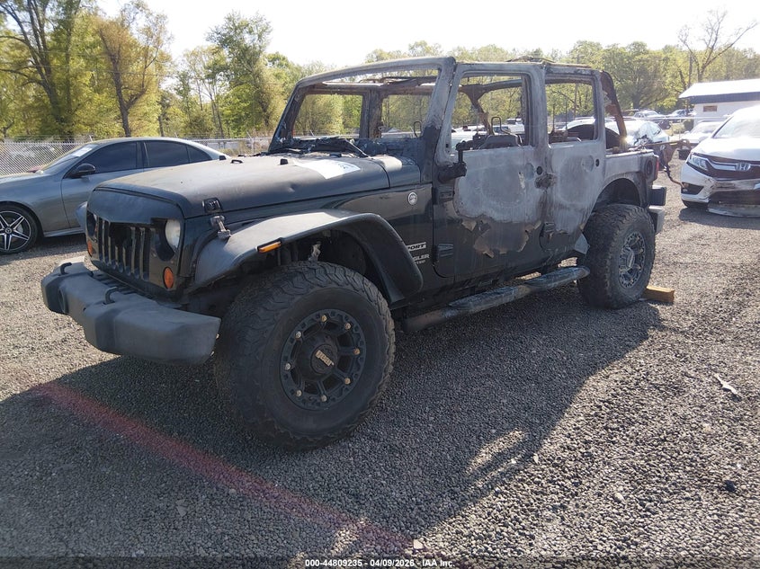 2012 Jeep Wrangler Unlimited Sport 1C4BJWDGXCL212861 photo 1