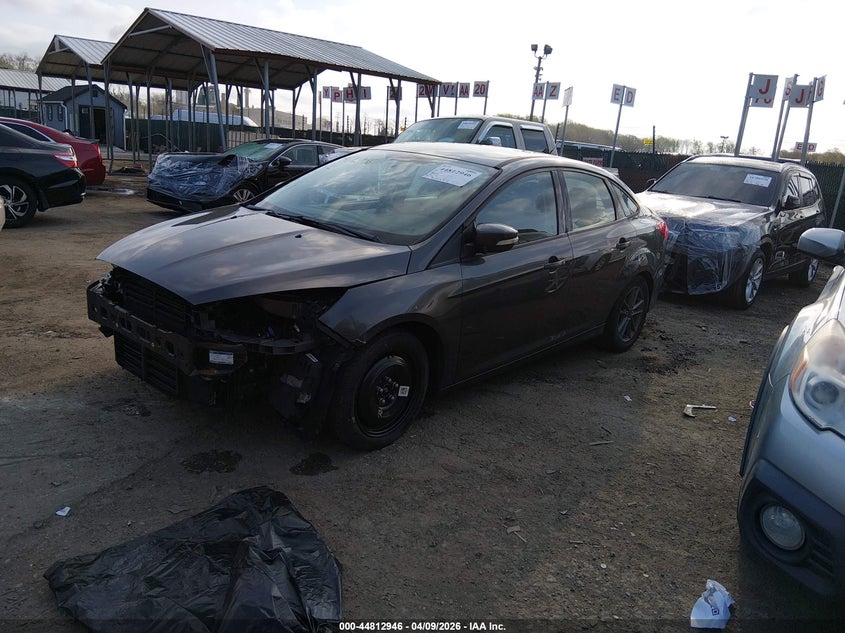 2016 Ford Focus Se 1FADP3F21GL281957 photo 1