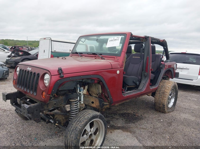 2013 Jeep Wrangler Unlimited Sahara 1C4BJWEG6DL508962 photo 1