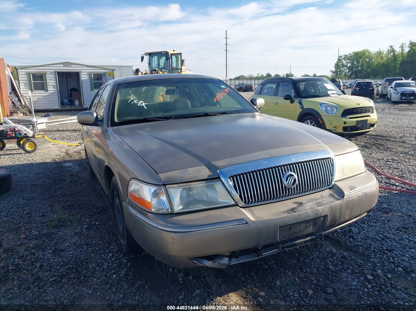 2003 Mercury Grand Marquis Gs VIN: 2MEFM74W03X704693 Lot: 44821444