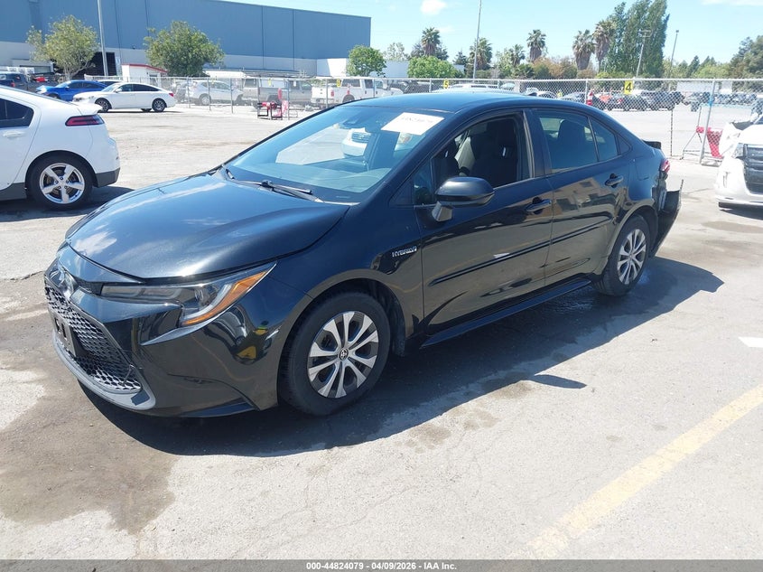 2021 Toyota Corolla Hybrid Le JTDEAMDE0MJ018823 photo 1