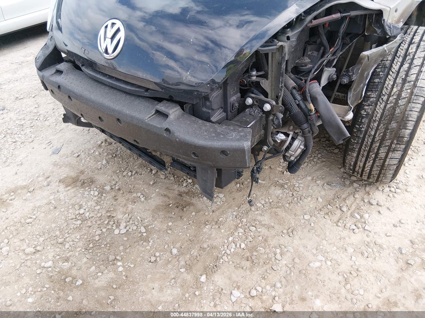 2014 Volkswagen Beetle 1.8T VIN: 3VWJ17AT1EM654574 Lot: 44837998