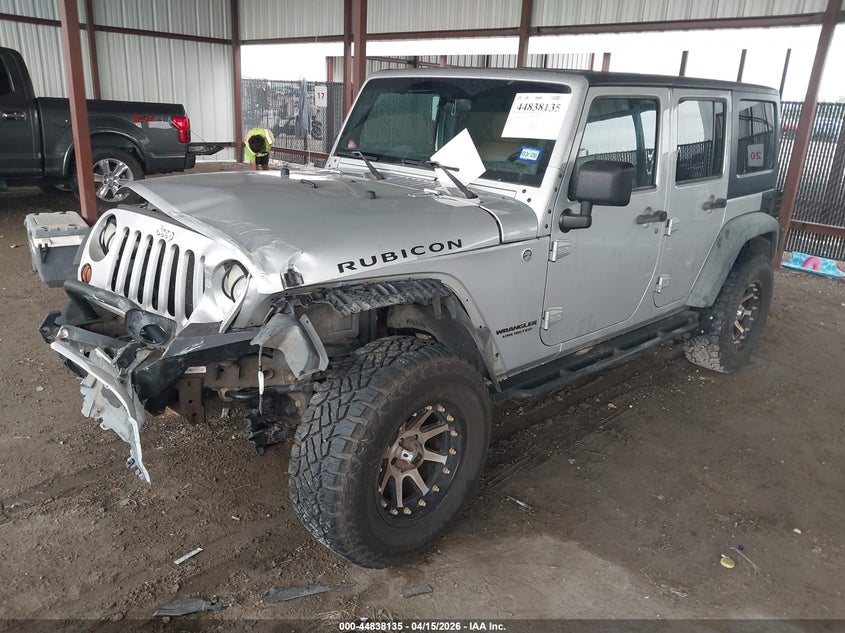2011 Jeep Wrangler Unlimited Rubicon 1J4HA6H18BL616024 photo 1