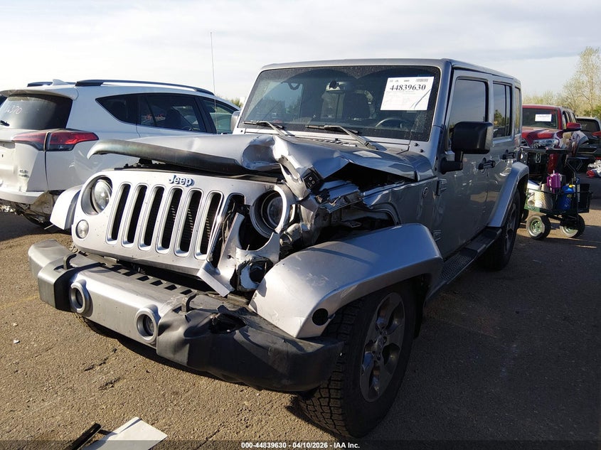2016 Jeep Wrangler Unlimited Sahara 1C4BJWEG8GL129157 photo 1