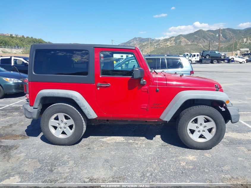 1J4AA2D15BL588909 2011 Jeep Wrangler / 3.8 Sport red