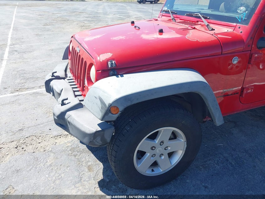 1J4AA2D15BL588909 2011 Jeep Wrangler / 3.8 Sport red