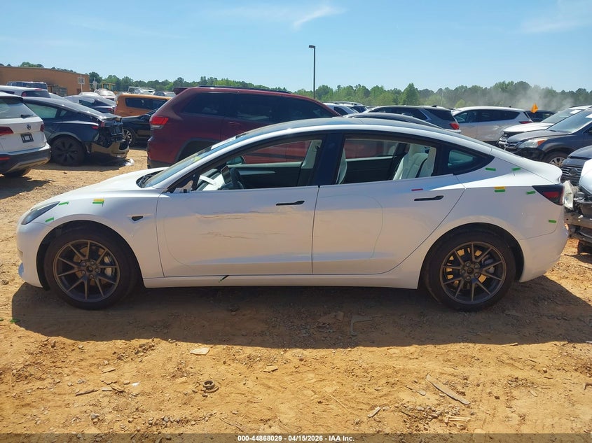 2023 Tesla Model 3 Long Range Dual Motor All-Wheel Drive VIN: 5YJ3E1EBXPF704667 Lot: 44868029