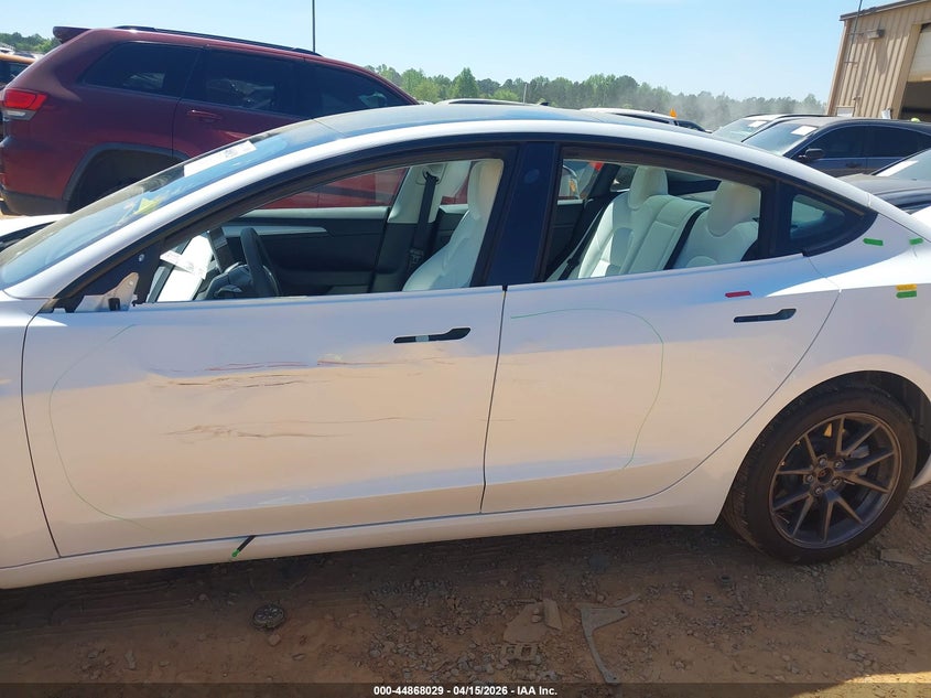 2023 Tesla Model 3 Long Range Dual Motor All-Wheel Drive VIN: 5YJ3E1EBXPF704667 Lot: 44868029