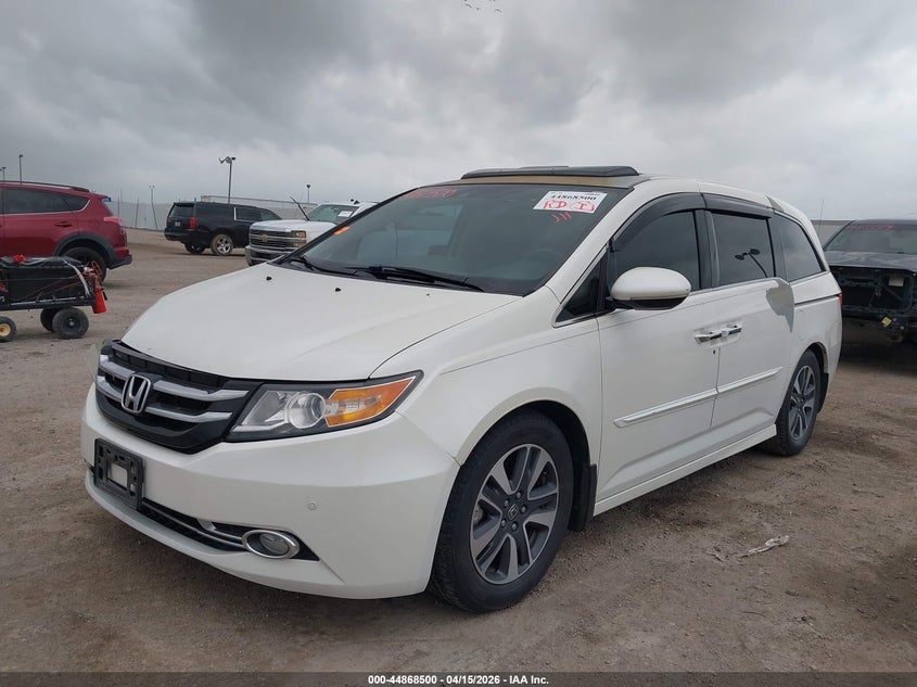 2014 Honda Odyssey Touring/Touring Elite 5FNRL5H94EB093046 photo 1