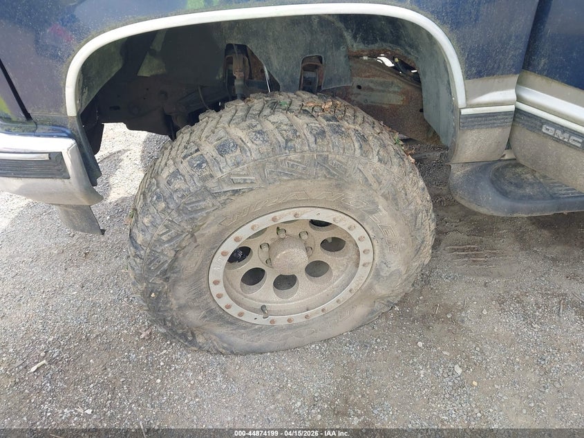 1999 GMC Yukon Sle VIN: 1GKEK13R1XJ703552 Lot: 44874199