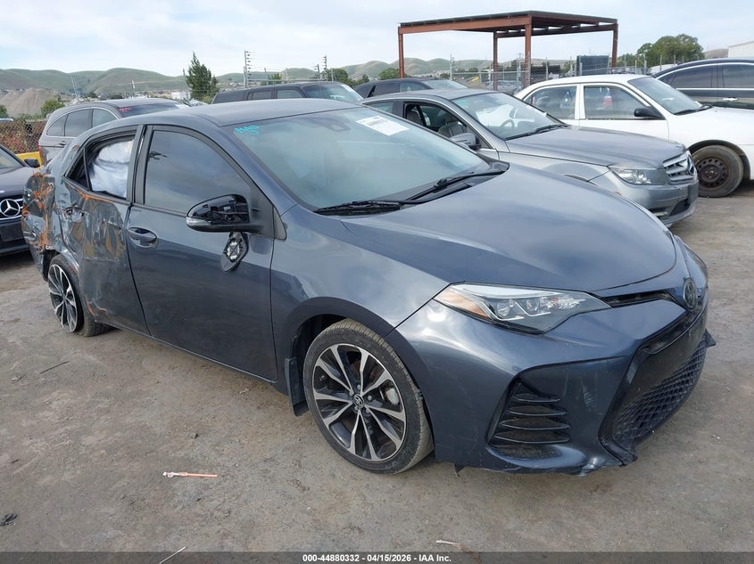 5YFBURHE0KP863827 TOYOTA COROLLA Photo 1