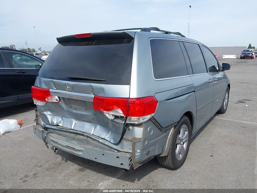 Vin: 5fnrl3h95ab041830, lot: 45395024, honda odyssey touring 20104