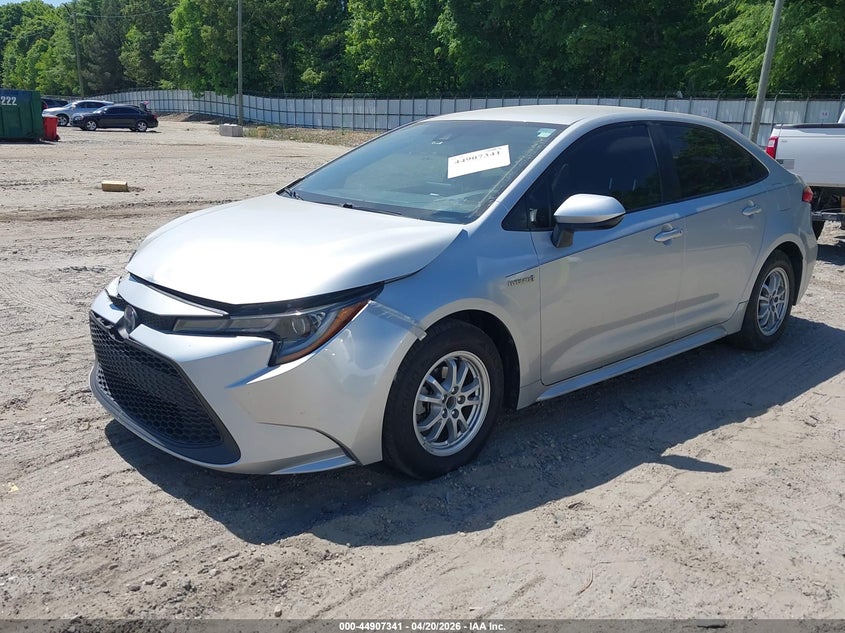 2021 Toyota Corolla Hybrid Le JTDEAMDE2MJ028155 photo 1