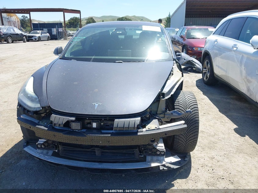 2018 Tesla Model 3 Long Range/Performance VIN: 5YJ3E1EB1JF069104 Lot: 44907695