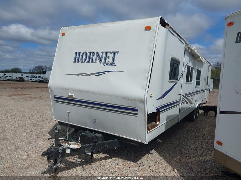 4YDT35F274E310999 2004 Keystone R35 Foot Trailer photo 1