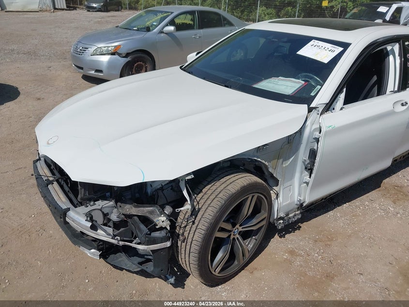 2018 BMW 740I VIN: WBA7E2C54JB216293 Lot: 44923240