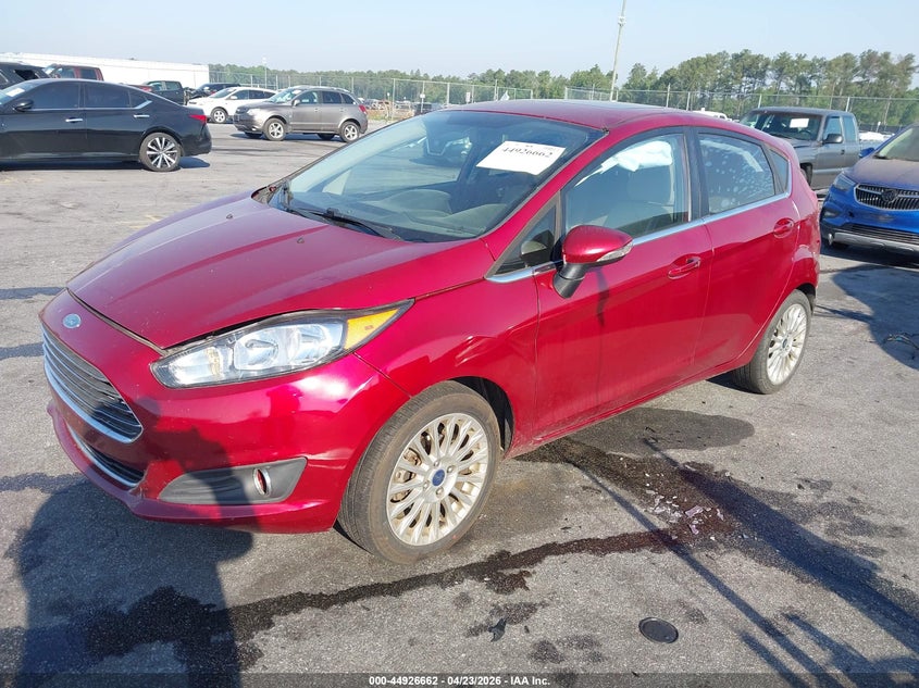 2014 Ford Fiesta Titanium 3FADP4FJ5EM177206 photo 1