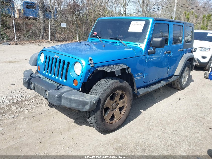 1J4BB3H10AL108128 2010 Jeep Wrangler Unlimited Sport photo 1