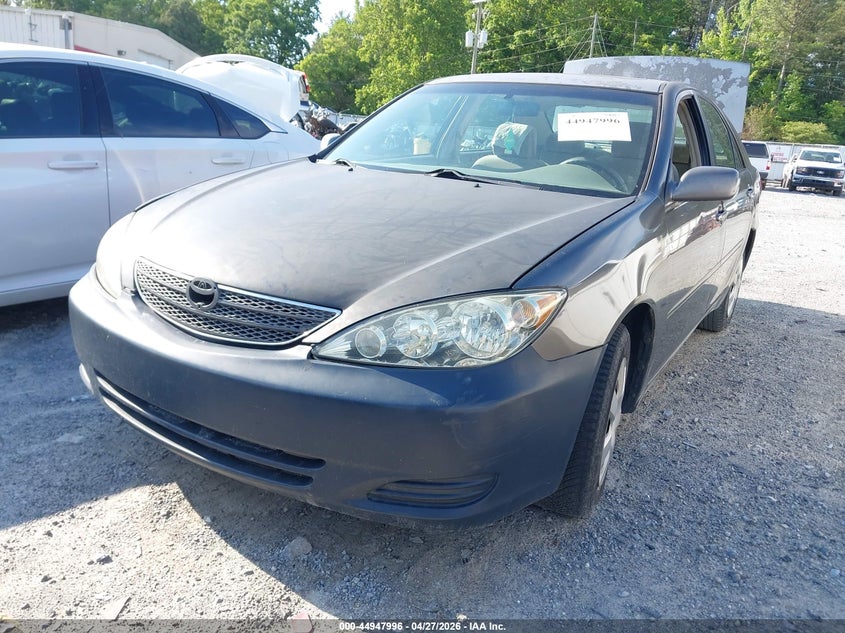 2002 Toyota Camry Le 4T1BE32K82U569874 photo 1