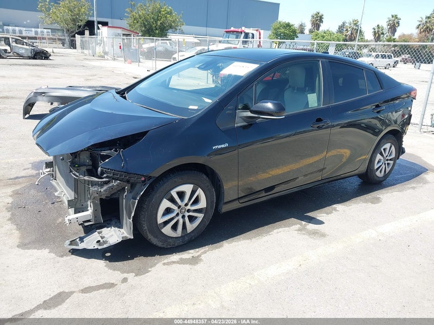 2021 Toyota Prius L Eco JTDKAMFU3M3134593 photo 1