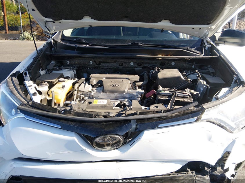 VIN JTMZFREV1JJ151097 2018 TOYOTA RAV4 LE