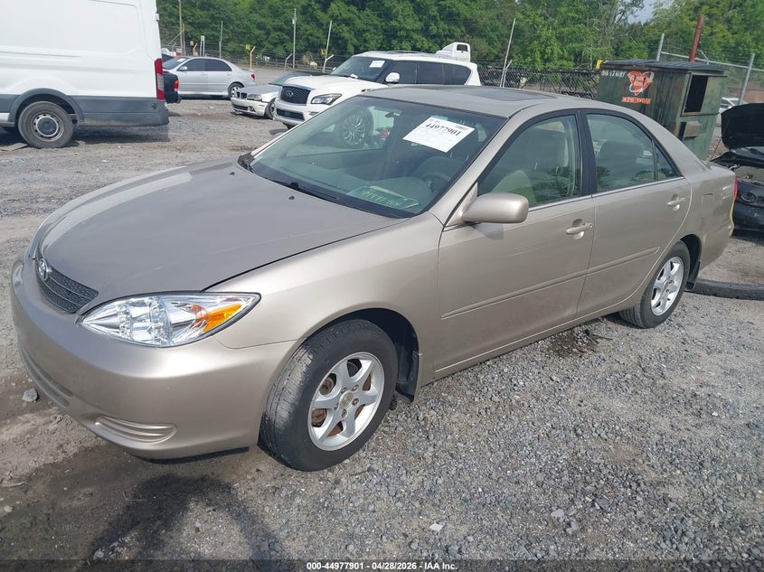 2002 Toyota Camry Le 4T1BE32K22U638400 photo 1