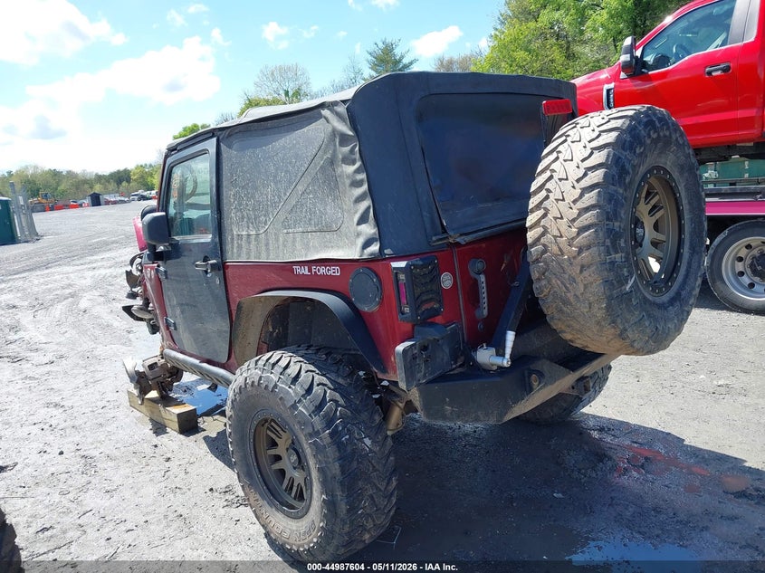 1J4AA2D19BL569571 2011 Jeep Wrangler / 3.8 Sport brown
