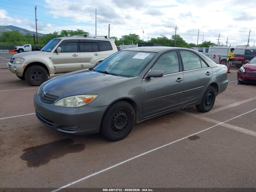 2002 Toyota Camry Le/Se/Xle JTDBE32K720103140 photo 1