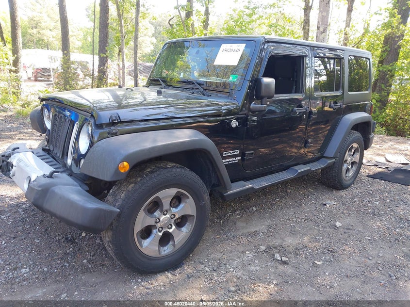 1C4BJWDG2FL694049 2015 Jeep Wrangler Unlimited Sport photo 1