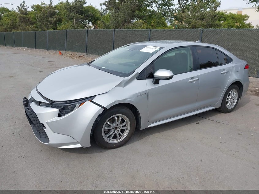 2021 Toyota Corolla Hybrid Le JTDEAMDE7MJ015675 photo 1