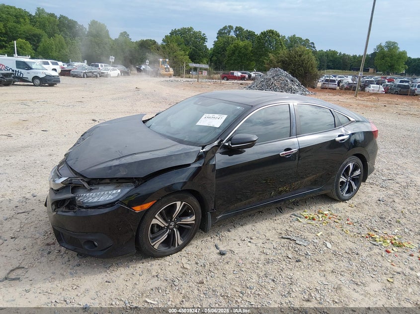 2017 Honda Civic Touring 19XFC1F9XHE031482 photo 1