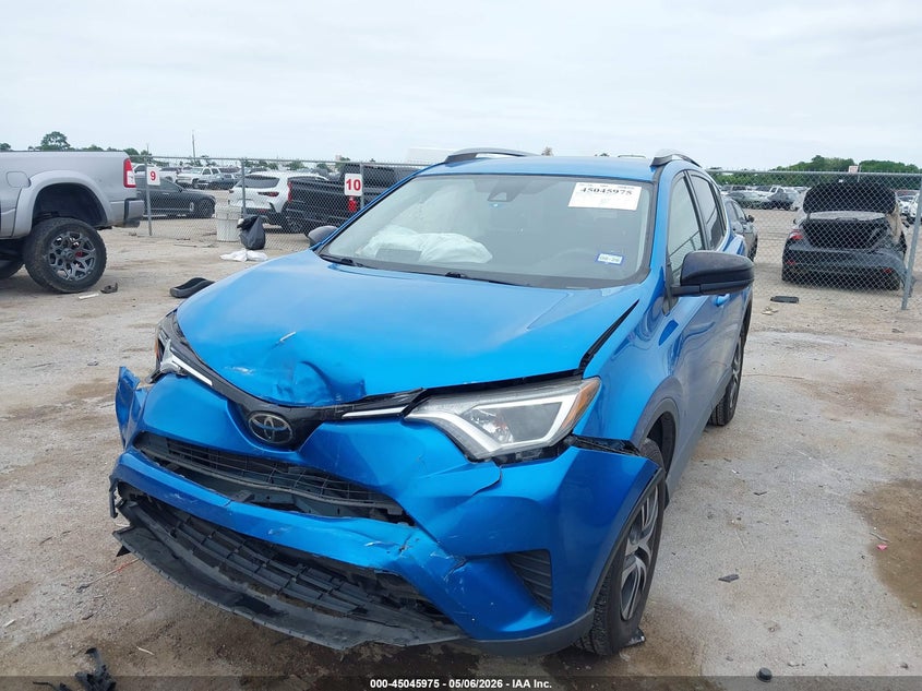 VIN JTMZFREV7JJ735049 2018 TOYOTA RAV4 LE