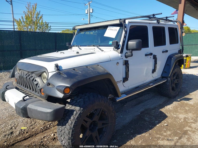 1C4BJWEG0CL284439 2012 JEEP WRANGLER UNLIMITED SAHARA photo 1
