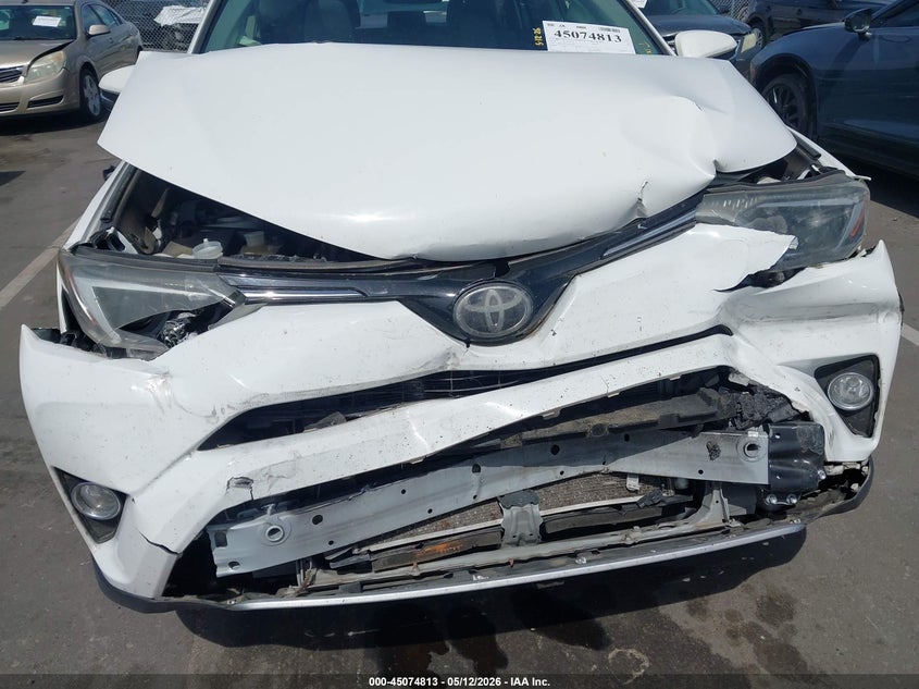 VIN JTMWFREV6JJ737698 2018 TOYOTA RAV4 XLE