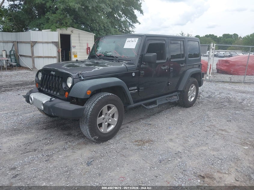 2012 Jeep Wrangler Unlimited Sport 1C4BJWDG5CL222522 photo 1