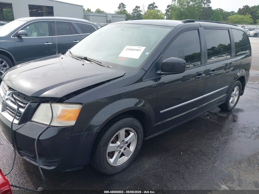 2010 Dodge Grand Caravan Sxt 2D4RN5D13AR409547 photo 1