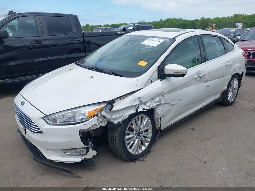 2016 Ford Focus Titanium 1FADP3J24GL201929 photo 1