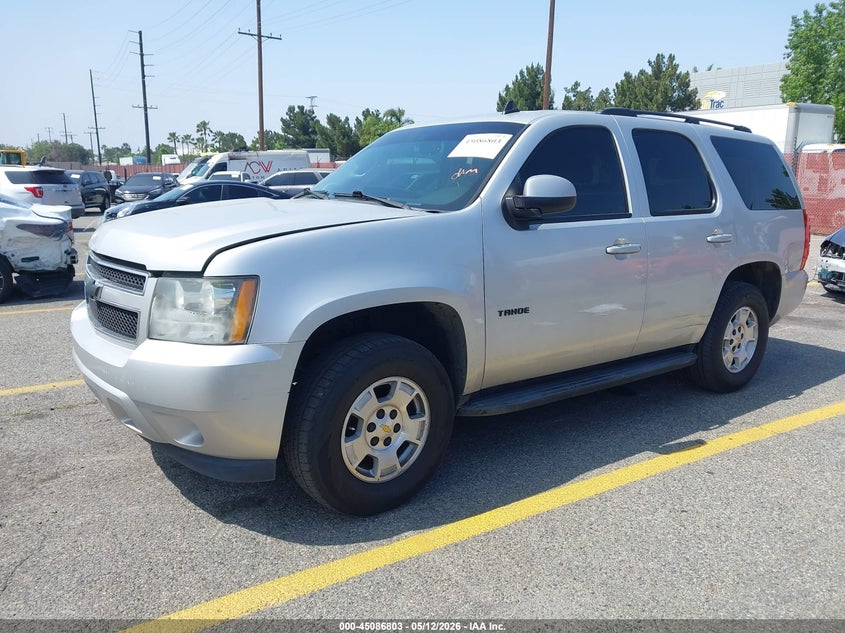 2010 Chevrolet Tahoe Ls 1GNMCAE30AR156884 photo 1