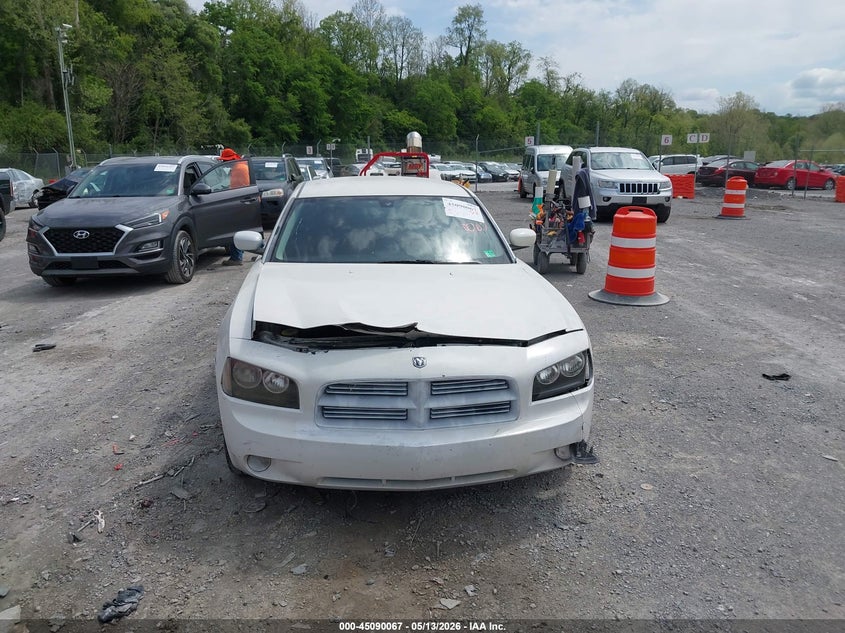 2009 Dodge Charger Srt8 VIN: 2B3LA73W49H590586 Lot: 45090067