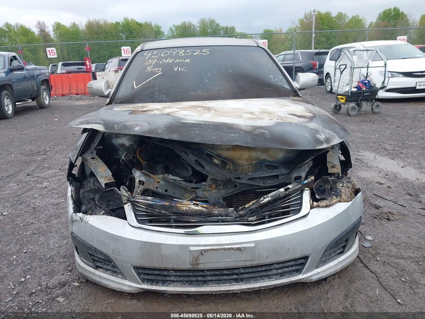 2009 Kia Optima 2.4 Lx silver Lot 111045098525 Vin KNAGE228095294575