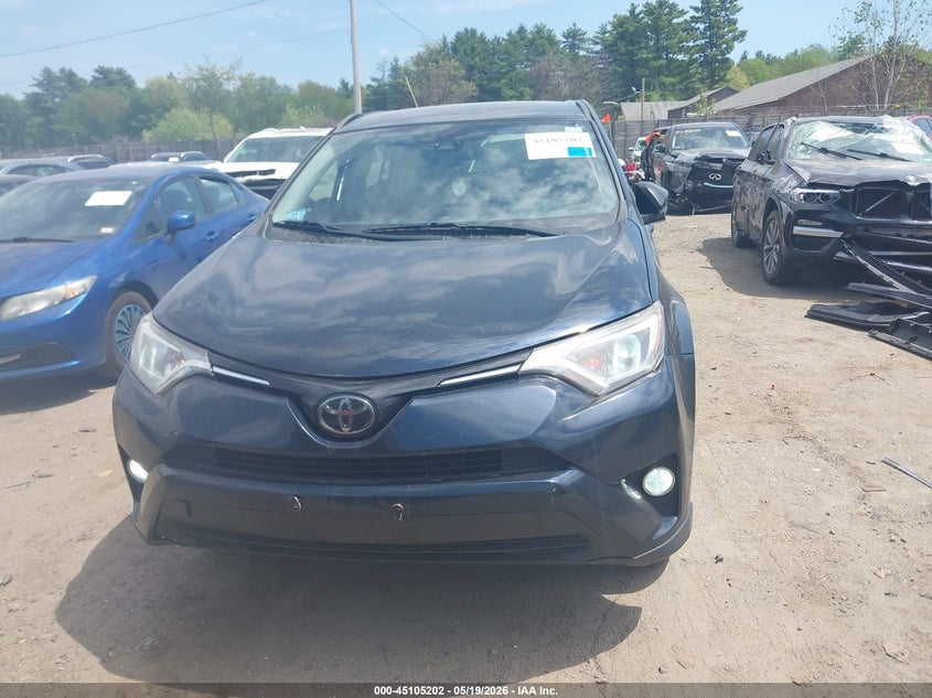 VIN JTMBFREV6JJ718874 2018 TOYOTA RAV4 LE
