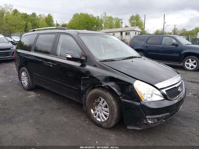 KNDMG4C77E6580249 KIA SEDONA Photo 1