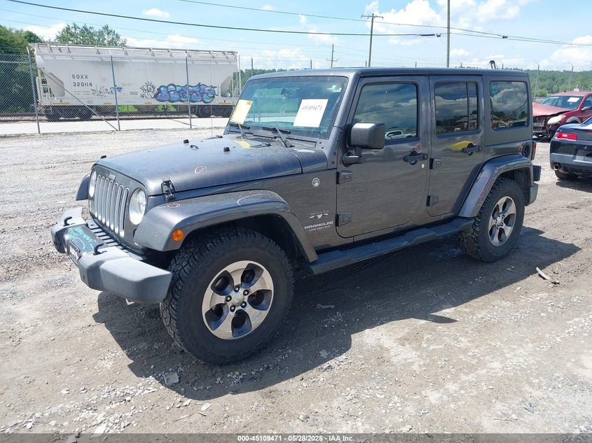 2016 Jeep Wrangler Unlimited Sahara 1C4HJWEG1GL162852 photo 1