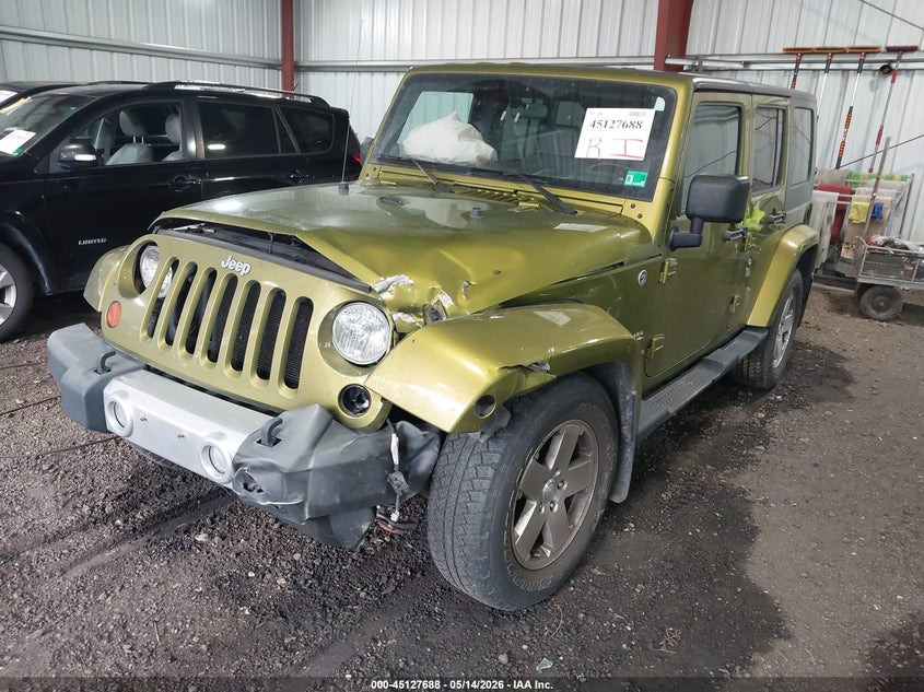 2008 Jeep Wrangler Unlimited Sahara 1J4GA59148L599090 photo 1