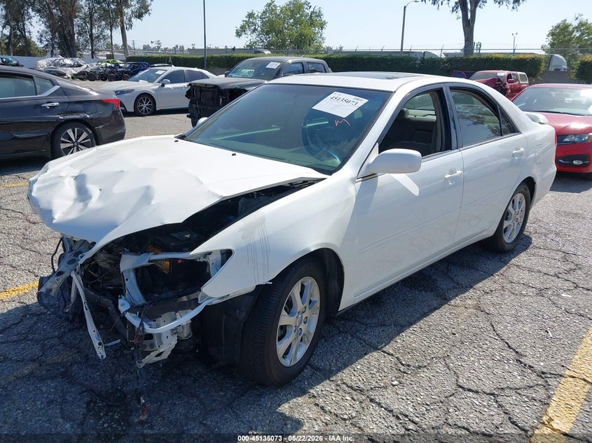 2004 Toyota Camry Le JTDBE32K540284998 photo 1