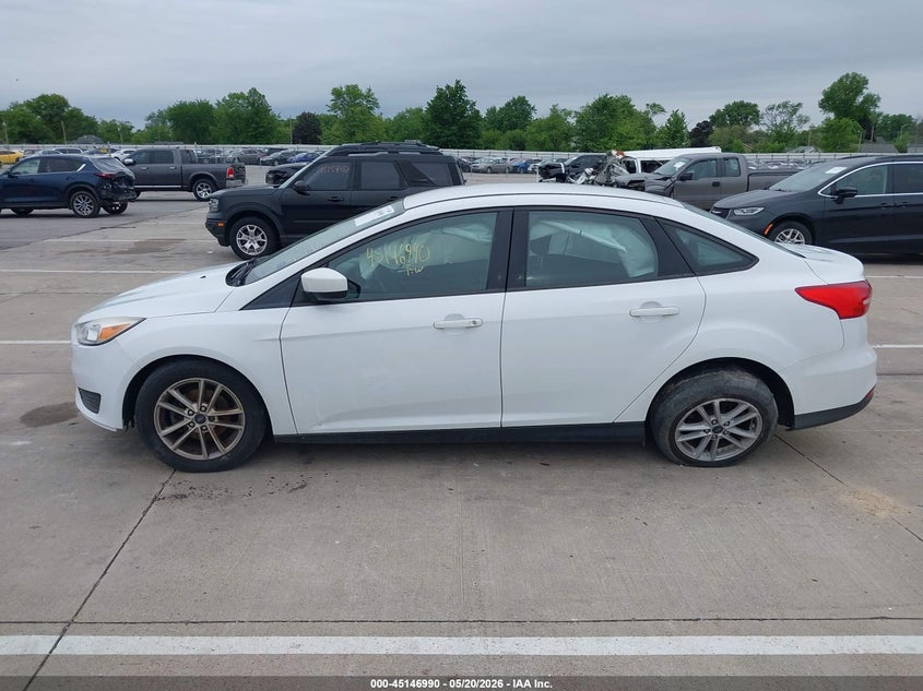 VIN 1FADP3FE1JL219802 2018 FORD FOCUS SE