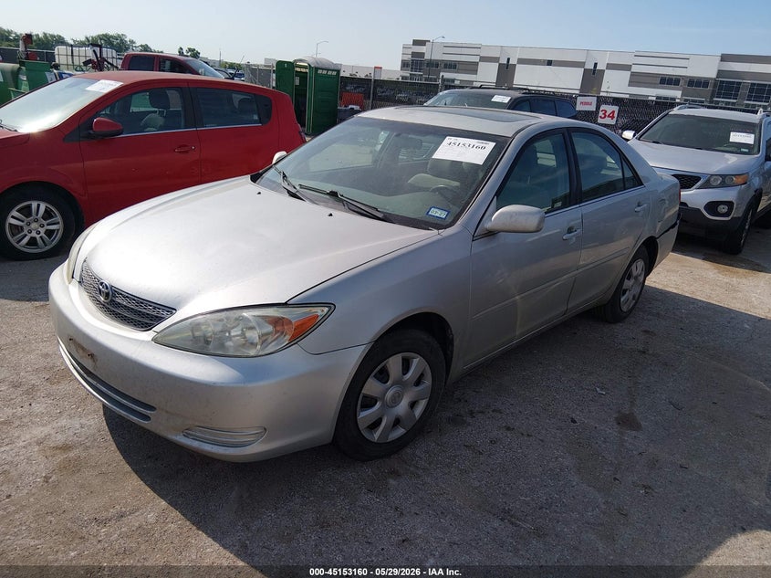 2004 Toyota Camry Le 4T1BE32K04U912034 photo 1